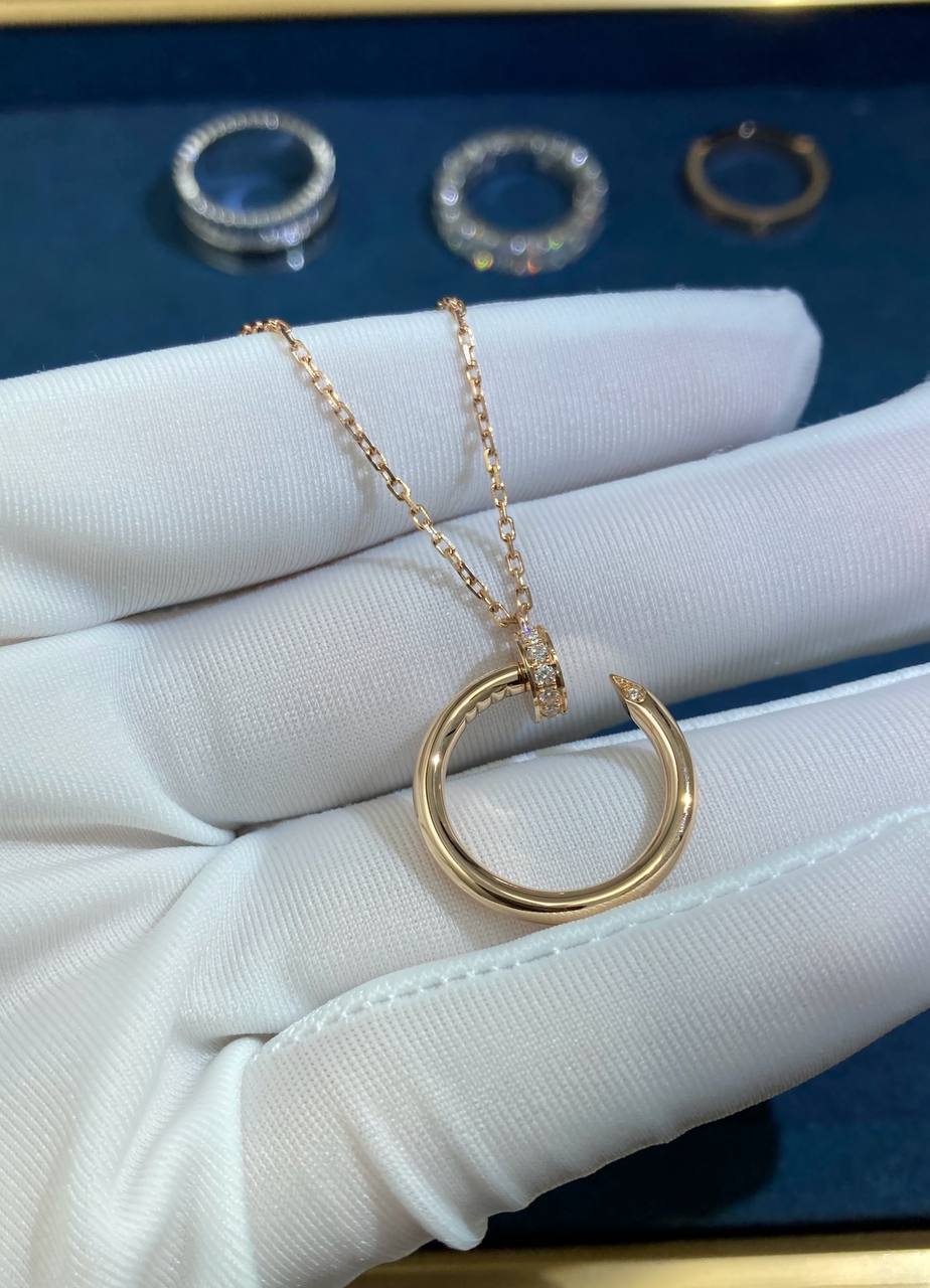 Nail Inspired pendant with diamonds