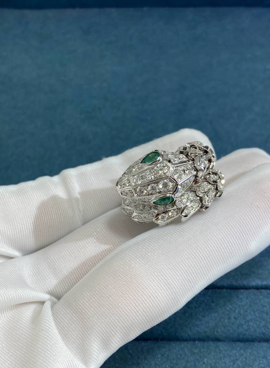 Serpent diamond ring with emeralds