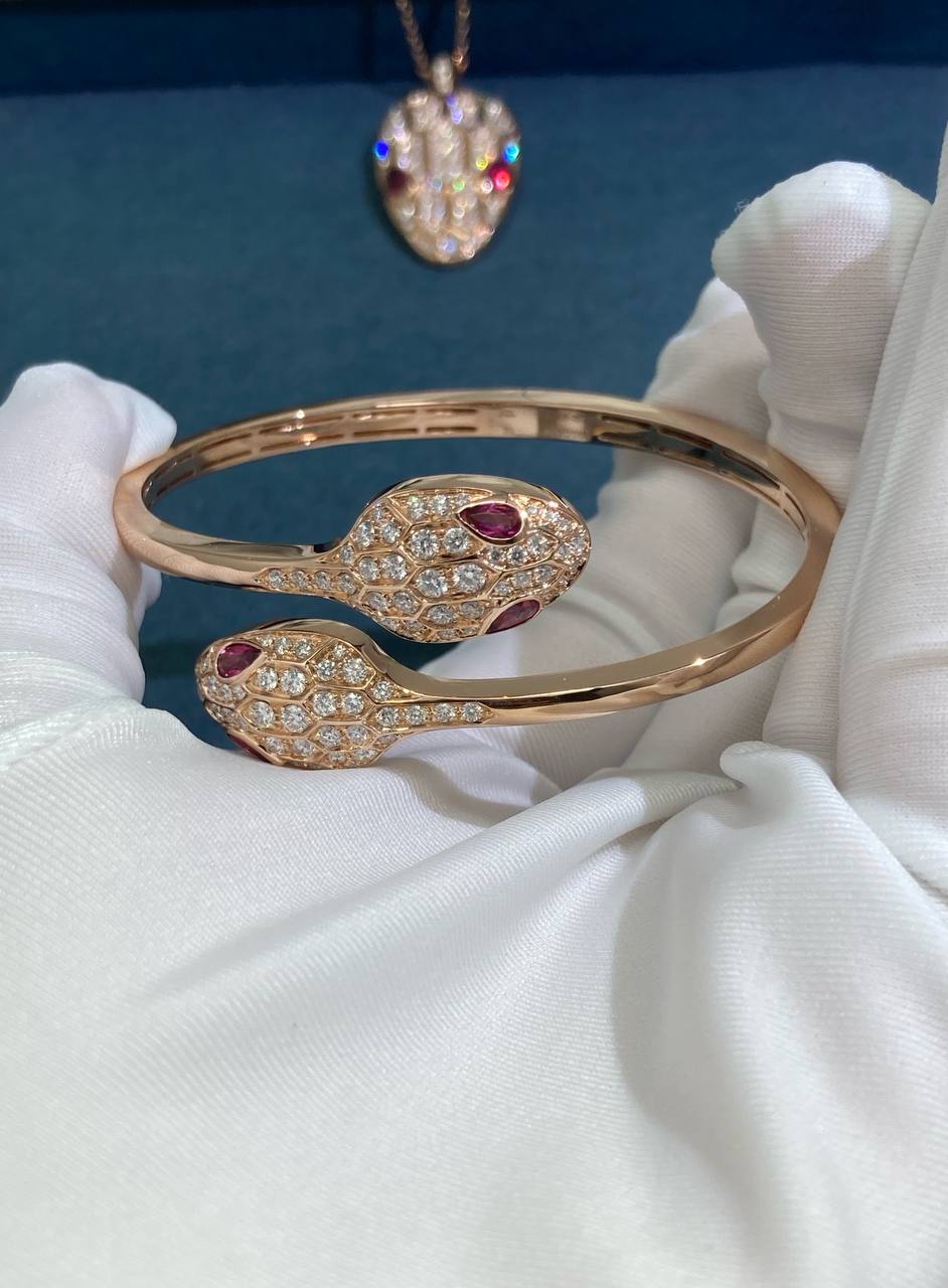 Serpent double head diamond bracelet with Rubellites