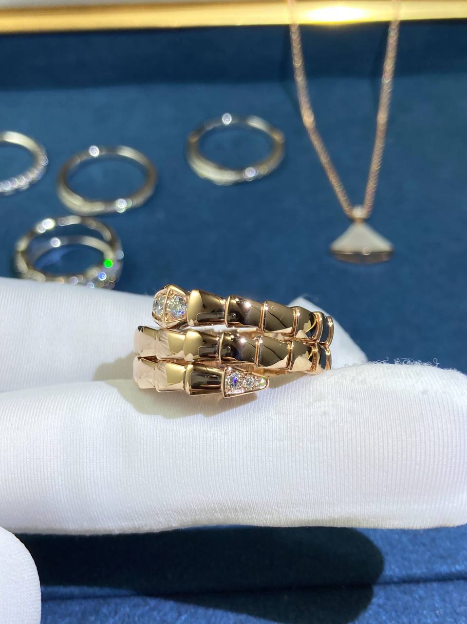 Serpent double row ring with diamonds