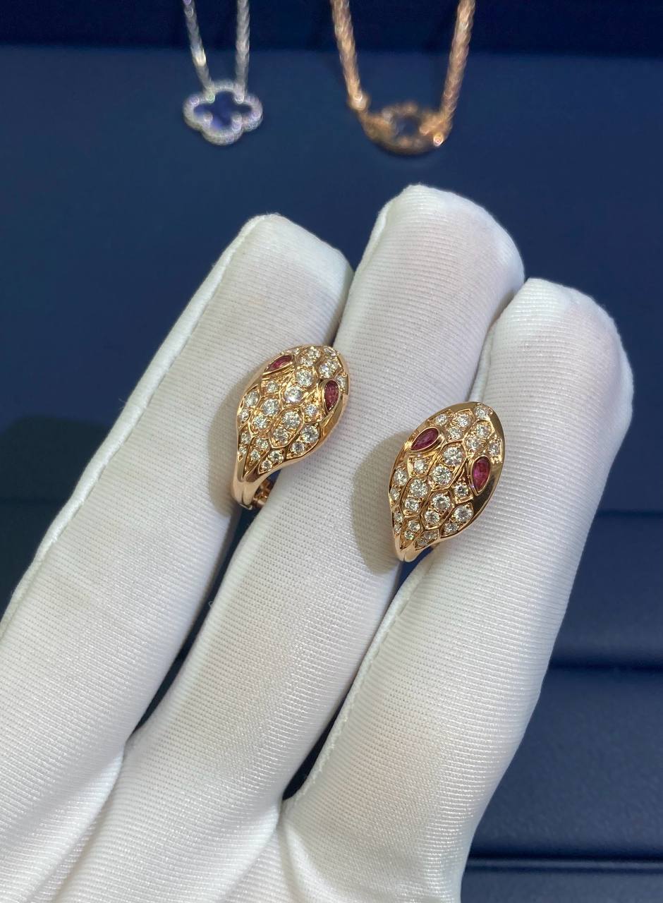 Serpent diamond earrings with Rubellites