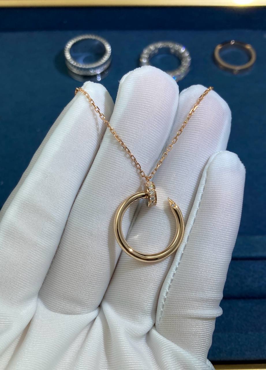 Nail Inspired pendant with diamonds