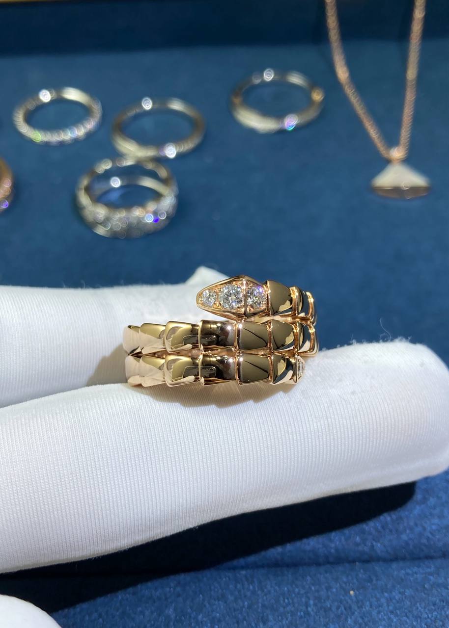 Serpent double row ring with diamonds