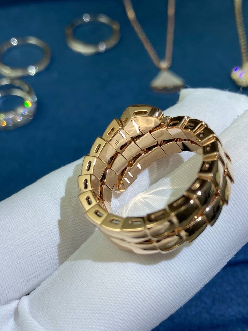 Serpent double row ring with diamonds