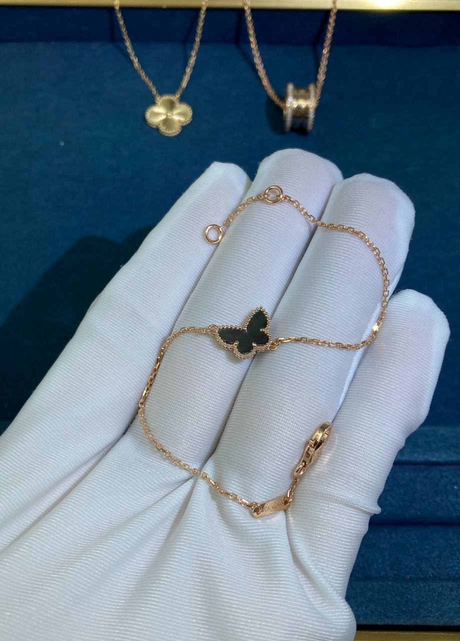 Pulsera mariposa VC gris nácar modelo mini