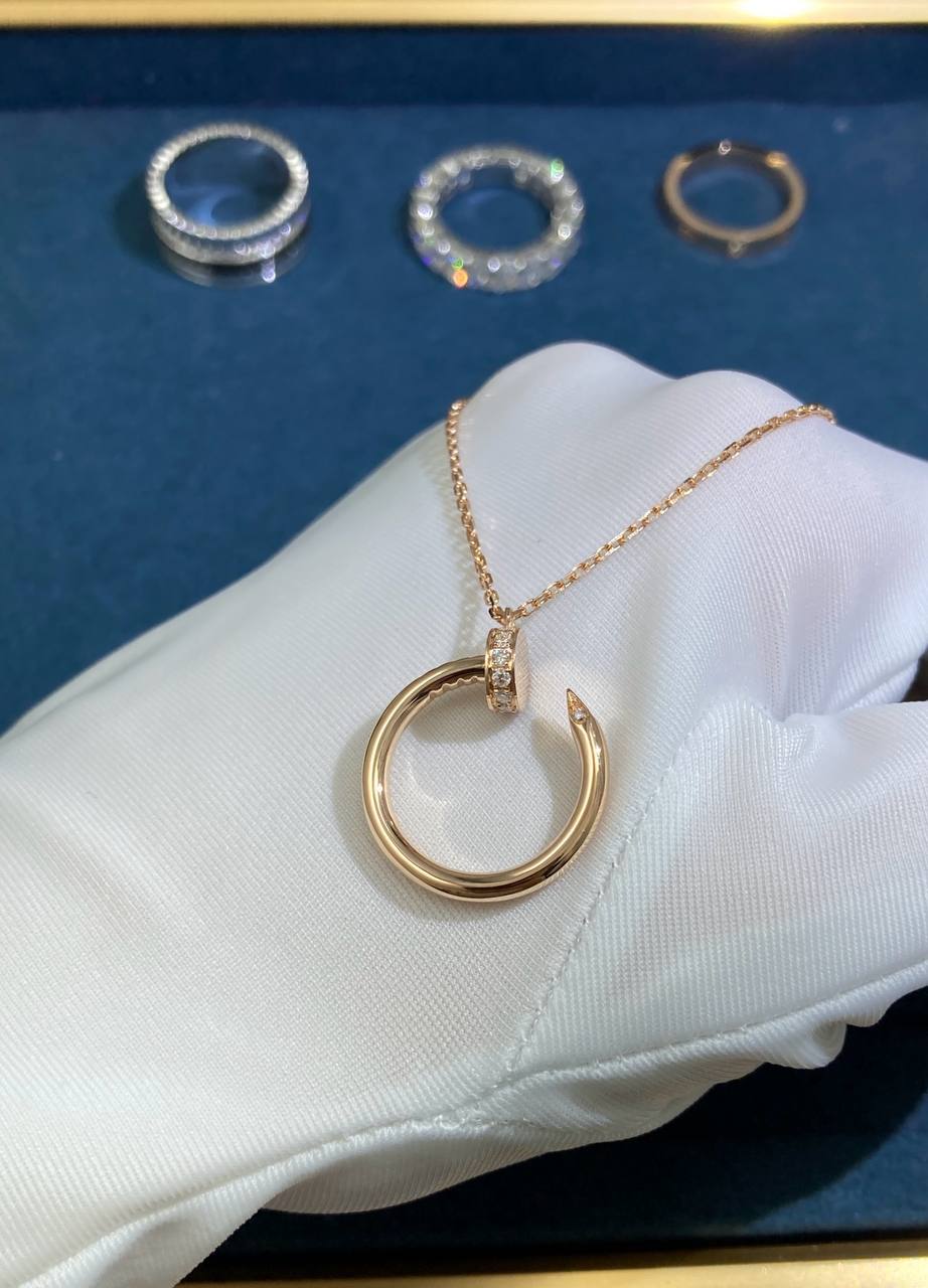 Nail Inspired pendant with diamonds