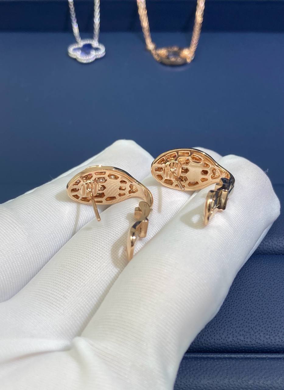 Serpent diamond earrings with Rubellites