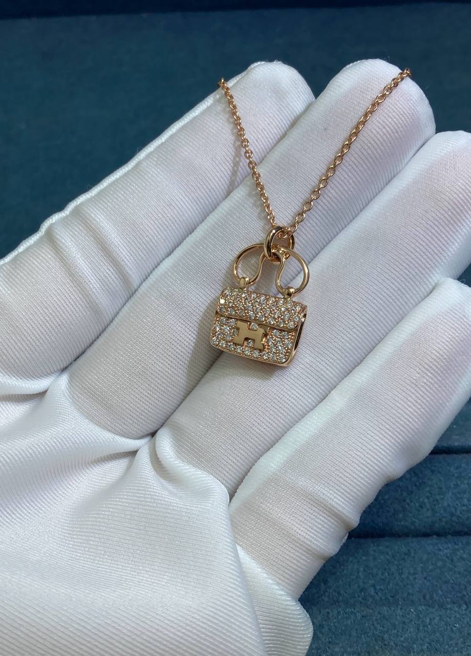 Amulettes Constance pendant with pavé diamonds