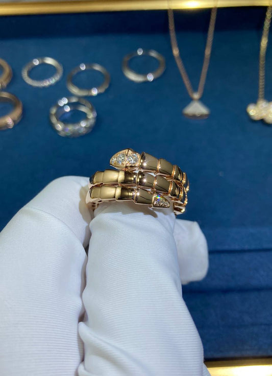 Serpent double row ring with diamonds