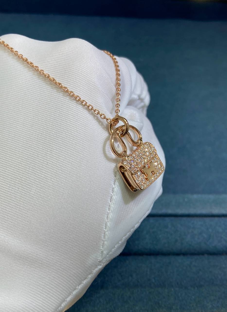 Amulettes Constance pendant with pavé diamonds