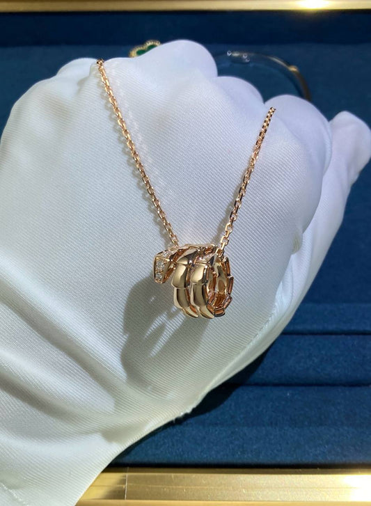 Serpent pendant with diamonds